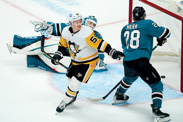 Guentzel’s OT goal lifts Pens over Sharks